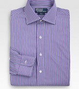 A trim-fitting look in crisp, two-ply cotton with preppy stripes for a refined look. Buttonfront Moderate spread collar Embroidered logo detail Cotton Machine wash Imported 