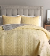 Bryan Keith's Santa Barbara quilt brightens up the bedroom with a beautiful sunny yellow color and allover quilted details in a modern floral motif for style and depth. Reverses to a white-on-gray floral pattern.