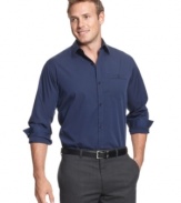Classic can take you from the office to dinner and so does this solid dress shirt from Calvin Klein.