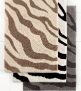 Go wild! Turn your bathroom into a chic safari with this Zebra bath rug from Charter Club, featuring a bold zebra-inspired pattern in three neutral color palettes to coordinate with any bath decor. Quick drying finish, ultra-absorbency and no-slip latex backing complete this plush rug.