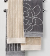 A breath of fresh air. Martha Stewart Collection revives your bathroom in carefree style with this Calendula bath towel, featuring either a stripe or floral pattern in two neutral hues.