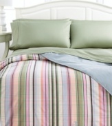 Show off your softer side with the incredibly cozy Martha's Vineyard down-alternative comforter from Lauren Ralph Lauren. This plush comforter boasts a pattern of preppy stripes on one side and soothing blue solid on the other, accented with an embroidered Lauren Ralph Lauren monogram at the base. Finished with stitched edges.