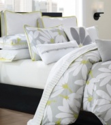 Everything's coming up daisies... this mod, fun comforter set creates a bright outlook with a bold floral pattern in soft 300 thread cotton sateen. Reverses to a solid 200 thread cotton for a great second look. Comfortably oversized and plumped with 12-oz. polyester fill. Shams feature citrus piping to highlight the pattern beautifully. A solid grey bedskirt grounds the look with sophistication.