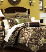 Lenox brings a classic appeal to these Heritage comforter sets, featuring a large scale jacquard woven flourish design accented with stripes for a handsome presentation. Finished in bold brown and green tones.