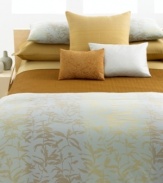 Set in soft combed cotton, this Pyrite Luster sham from Calvin Klein Home features abstracted climbing leaves woven with an ombré effect of gold tones on an aqua sateen ground. Its distinctive style offers a beautiful coordinate to the Pyrite Luster duvet cover.