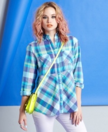 Fire updates the classic plaid button-down top with a soft-hued palette and empire-waist design. Fire updates the classic plaid button-down top with a soft-hued palette and empire-waist design.