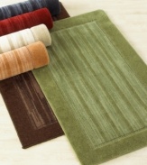 Offering timeless sophistication, this framed-stripe rug is available in six rich hues to complement any home décor. This handsome rug also features a stic-tite latex backing to stay in place at all times.