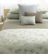 Style meets serenity with the cool tones and watercolor blossoms of Calvin Klein's Mercury Flower duvet cover. Featuring luxurious 220-thread count combed cotton percale. Reverses to self; hidden button closure.