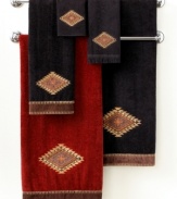 Style your bath with the spirit of the Southwest. Featuring an embroidered Aztec medallion appliqué and fringe trim, the Mojave fingertip towel invigorates your bath with rich color and stunning details.