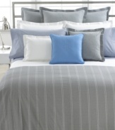 Inspired by London's Jermyn Street, this comforter from Lauren by Ralph Lauren features bold grey stripes and a delicate bar-tack quilt stitch for a sophisticated air.