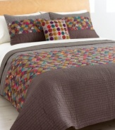 Patchwork never looked so good. The charming mini triangles quilt features a pieced-together look from a myriad of colors and prints in a chic, geometric design. Coordinate this vibrant quilt with any solid sheeting for a look that's totally your own. (Clearance)