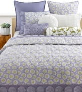 Sumptuous quilting with detailed circle embroidery lends a warm accent to the Sakura bedding from Style&co. A reverse solid purple design enhances the collection with soothing color.