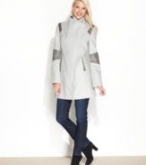 Modern styling elevates this coat from Calvin Klein. Its sleek colorblocking and faux-leather trim add dimension and flair to your winter wardrobe!