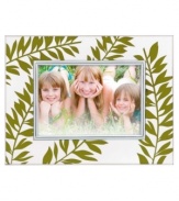 Silhouetted ferns unfurl in green across this softly frosted crystal picture frame, bringing a fresh hint of the outdoors in. Its clean rectangular shape is etched for earthy allure no matter what's pictured. Qualifies for Rebate