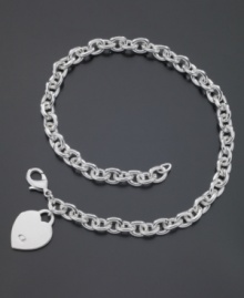 A stunning chain ends with a simple heart charm on this versatile necklace by GUESS. Logo at charm. Approximate length: 15 inches. A stunning chain ends with a simple heart charm on this versatile necklace by GUESS. Logo at charm. Approximate length: 15 inches.
