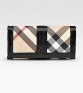 A sleek continental silhouette crafted from signature check PVC and rich leather trim.Snap button closureFive open pocketsOne zip pocketFifteen credit card slotsNylon lining7½W X 3½H X 1/2DMade in Italy