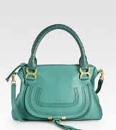 EXCLUSIVELY AT SAKS ASH, RUBY AND TEAL. Luxe calfskin defines this contoured crossbody design, finished with tonal stitching for textured appeal.Tennis-wrapped double top handles, 6 drop Adjustable crossbody strap, 17½ drop Top zip closure Hidden open pocket under front flap One inside zip pocket One cell phone pocket Cotton lining 14½W X 11H X 4½D Made in Italy