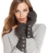 Be beautifully buttoned up this winter. Start with these chic knit gloves from MICHAEL Michael Kors that are adorned with signature-embossed snap buttons.