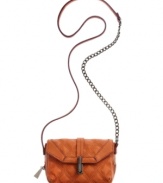 Quilted and cued for adventure, this ready-for-anything crossbody from RACHEL Rachel Roy goes from downtown dance club to uptown art gallery. Accented with chain-link details and antiqued silvertone hardware, its compact interior easily stows wallet, phone, keys and makeup.