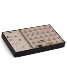Bury treasure in a drawer with the Blaine jewelry organizer from Mele & Co. A large ring roll and divided sections for chains, pendants, bracelets and more keep every piece in pristine condition. With handsome faux leather exterior. Bury treasure in a drawer with the Blaine jewelry organizer from Mele & Co. A large ring roll and divided sections for chains, pendants, bracelets and more keep every piece in pristine condition. With handsome faux leather exterior.