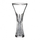 The vertical cuts tracing the neck of this traditional Waterford crystal vase reflect light with singular prismatic opulence.