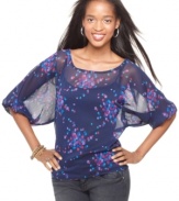 Life's a party in Living Doll's confetti printed top! Super-comfy, wear it with skinny jeans for an irresistibly cute look.