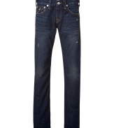 A stylishly distressed dark wash and contemporary slim cut makes these True Religion jeans a casual must-have - Five-pocket style, button closure, belt loops, large decorative double stitch details, buttoned back flap pockets - Slim, straight leg - Style with a worn-in tee and lace-up biker boots