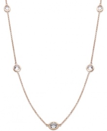 Layer yourself with inches of sparkle. This delicate necklace is crafted in 14k rose gold over sterling silver, with round-cut white topaz stations (4 ct. t.w.). Approximate length: 17 inches.