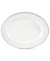 Gracefully understated, the Tanglewood oval platter by Mikasa is swept with romantic scrolling florals in pure white. A polished platinum edge refines already-elegant porcelain to enhance every occasion.
