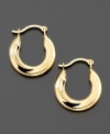 Big fashion comes in small sizes. You'll love these polished 14k gold tube hoop earrings. Approximate diameter: 1/4 inch.