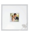 Treat a special couple to the True Love autograph frame. Interlocking hearts adorn this elegant, silver-plated showcase for a cherished wedding photo. A broad rim accommodates signatures from bridal shower or reception guests. Qualifies for Rebate