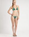 A stretch bottom with a sexy animal print and chain-link enhanced sides. Stretch bottomChain-link sides84% polyamide/16% elastaneFully linedHand washImported Please note: Bikini top sold separately. 