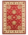 Bring the brilliance of ancient Persian textile design home with this vibrant red Lyndhurst area rug from Safavieh. Crafted from soft polypropylene, this rug radiates timeless allure with the added convenience of easy-care construction. (Clearance)