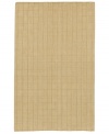 Natural jute fibers are hand-woven in India to produce this durable area rug from the master weavers at Surya. Beige and light-brown tones play off one another to create a simple, yet engaging field of plaid-like patterns.