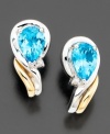 Breathtaking beauty in an elegant earring. Pear-shaped blue topaz (1-5/8 ct. t.w.) with round-cut diamond accents set in 14k gold & sterling silver. Approximate length: 1/2 inches.