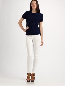 A cable knit design with a luscious cashmere-infused cotton fabrication. CrewneckShort sleevesAbout 22 from shoulder to hem90% cotton/10% cashmereDry cleanImported Model shown is 5'10 (177cm) wearing US size Small.