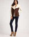 Faux suede surrounded by plush faux shearling and rib-knit sleeves. Polyester faux shearling collar Long ribbed sleeves Asymmetrical front zipper Ribbed hem 80% acrylic/20% polyester faux fur lining About 27 from natural waist 50% acrylic/30% wool/20% nylon Hand wash Imported