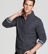 A soft, marled cashmere sweater keeps you warm whether you're outside building a snowman or sipping cocoa by the fire.