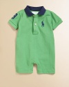 Short-sleeved polo shortall in soft, breathable cotton accented with a ribbed knit collar and applied twill 3 patch.Polo collarShort sleevesFront buttonsBottom snapsCottonMachine washImported Please note: Number of snaps may vary depending on size ordered. 
