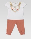 A sumptuous cotton knit is adorned with a colorful charms print for a pretty, girly touch.CrewneckShort puffed sleevesBack closure with mother of pear button92% cotton/8% elastamMachine washMade in Italy Please note: Number of buttons may vary depending on size ordered. 