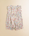 Bold, blooming flowers and ruffled details enliven a timelessly sweet bubble rendered in airy seersucker cotton.Ruffled crewneckShort flutter sleevesFront buttonsRuffled, elastic empire waist with sewn bowBottom snapsRuffled, elastic leg bandsCottonMachine washImported Please note: number of buttons and snaps may vary depending on size ordered. 