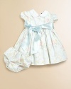A charming dress in a stripe and floral pattern has a pretty, full skirt with a petticoat and a satin sash.Peter Pan collar with eyelet trimShort puffed sleevesBack buttonsGathered empire-waist silhouetteWaistband with wide sash tieFull skirt with ruffled petticoatFully linedCottonMachine washImported Please note: Number of buttons may vary depending on size ordered. 