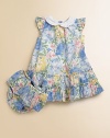A timeless dress is adorned with sweet floral print and complementing ruffles.Contrasting Peter Pan collar with ruffled trimRuffled cap sleevesBack buttonsTiered ruffle hemMatching bloomersCottonMachine washImported Please note: Number of buttons may vary depending on size ordered. 