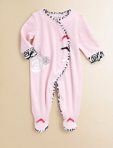 Embroidered, screened and appliquéd rosettes, plus tiny bows, adorn a cozy cotton knit footie that's super feminine.Rounded neckline with rosette print trimCurved snap frontLong sleeves with print cuffsSnap legsFeet with bows and print solesCottonMachine washImported Please note: Number of snaps may vary depending on size ordered. Embroidered, screened and appliquéd rosettes, plus tiny bows, adorn a cozy cotton knit footie that's super feminine.Rounded neckline with rosette print trimCurved snap frontLong sleeves with print cuffsSnap legsFeet with bows and print solesCottonMachine washImported Please note: Number of snaps may vary depending on size ordered.