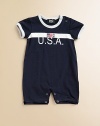 Baby will be ready for the races in this adorable one-piece Team USA tracksuit with contrasting trim and plenty of snaps for easy on and off.Crewneck with snapsShort sleevesBottom snaps90% cotton/10% spandexMachine washImported Please note: Number of snaps may vary depending on size ordered. 
