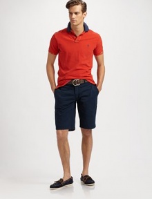 A traditional polo tailored for a classic, relaxed fit from breathable cotton mesh. Two-button placket Ribbed polo collar Embroidered logo detail Cotton Hand wash Imported A traditional polo tailored for a classic, relaxed fit from breathable cotton mesh. Two-button placket Ribbed polo collar Embroidered logo detail Cotton Hand wash Imported