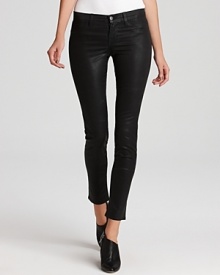 A coated finish lends a leather-like effect to these J Brand skinny jeans, creating a tough-chic look.