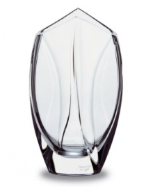 This elegant vase is small and striking and takes its shape from the inspiring look of a flower bud. In substantial, carefully crafted handmade crystal from Baccarat, with subtle curving waves of thickness along the sides and a mouth that comes to two gentle points, this vase is simply exquisite. This elegant vase is small and striking and takes its shape from the inspiring look of a flower bud. In substantial, carefully crafted handmade crystal from Baccarat, with subtle curving waves of thickness along the sides and a mouth that comes to two gentle points, this vase is simply exquisite.
