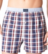 Classic style plaid boxer by Tommy Hilfiger is made from 100% cotton for all day comfort.