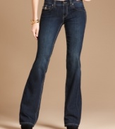 A pair of flared jeans gets glowing with the help of rhinestone buttons! INC's denim gives any outfit a glam touch!